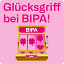 Werbegrafik von BIPA mit rosa Hintergrund: Ein pink-goldener Spielautomat mit Kleeblatt-Symbolen, darüber der Text „Glücksgriff bei BIPA!“.