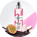 Bruno Banani Mysterious Coconut Body Splash 250 ml mit Passionsfrucht, Vanille und Kokos auf rosa Hintergrund