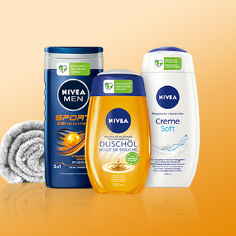 NIVEA Körperpflegeprodukte Sport, Duschöl & Creme Soft vor orangefarbenem Hintergrund. Link zur Markenseite/Körperreinigung