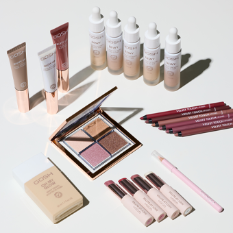 GOSH Make-up-Produkte: Foundation, Concealer, Lippenstifte, Lidschatten & Eyeliner auf weißem Hintergrund.