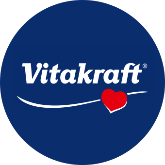 Vitakraft Logo mit rotem Herz auf blauem Kreis – bekannte Marke für Tiernahrung, Haustierbedarf & Tierliebe.