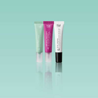 Ergänzende Hautpflegeprodukte in Pastellfarben – Booster, Masken und Spezialpflege.