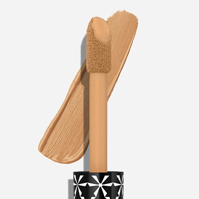 Manhattan Concealer mit großem Applikator in einem natürlichen Beige‑Ton, perfekt zum Abdecken, Aufhellen und Ausgleichen des Teints.