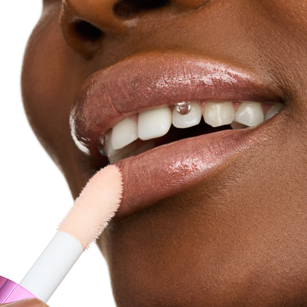 Bild: essence pearly POTION MULTI-REFLECTIVE LIPGLOSS