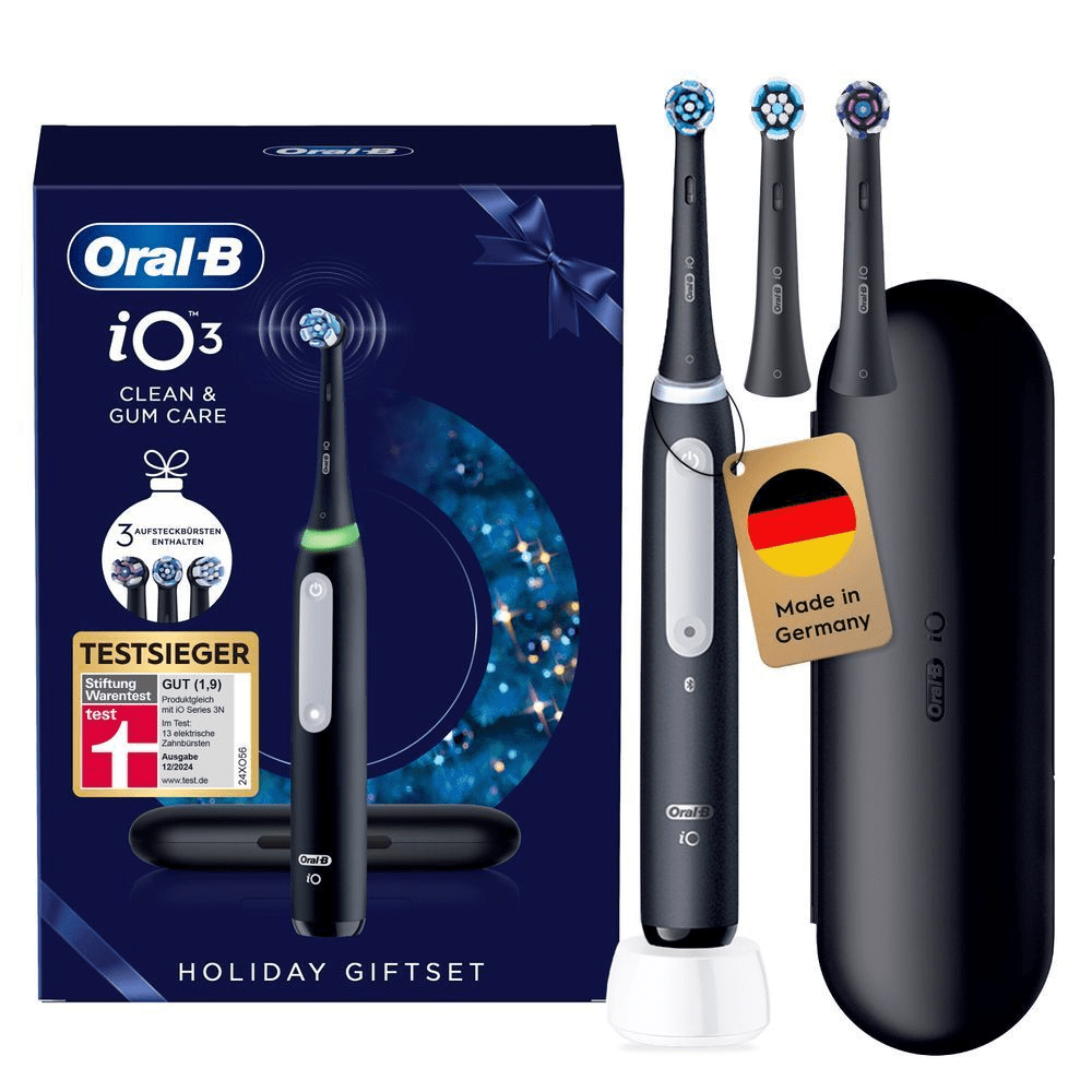 Oral-B iO3 Holiday Geschenkset mit Verpackung, drei Aufsteckbürsten und Etikett "Made in Germany".