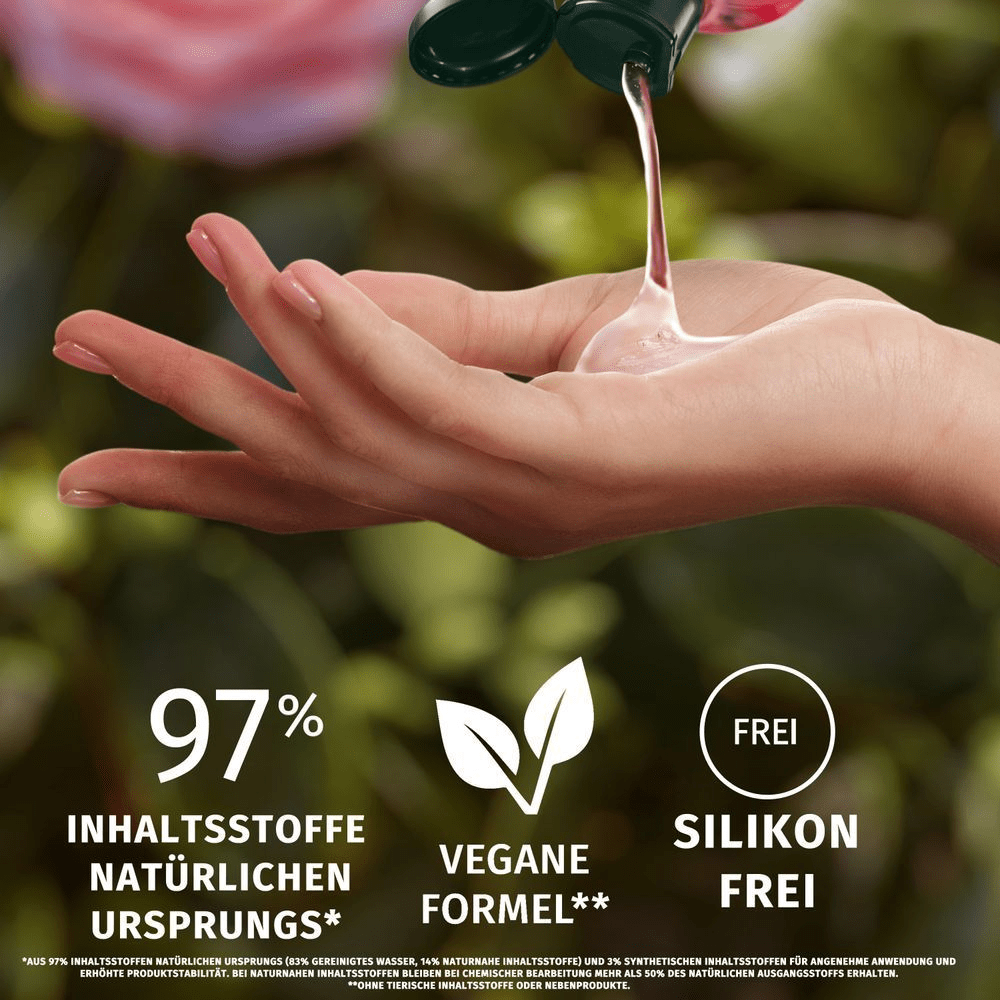 Herbal Essences Produkt wird in eine Hand gegossen, um die 97% natürlichen Inhaltsstoffe und die silikonfreie, vegane Formel hervorzuheben.