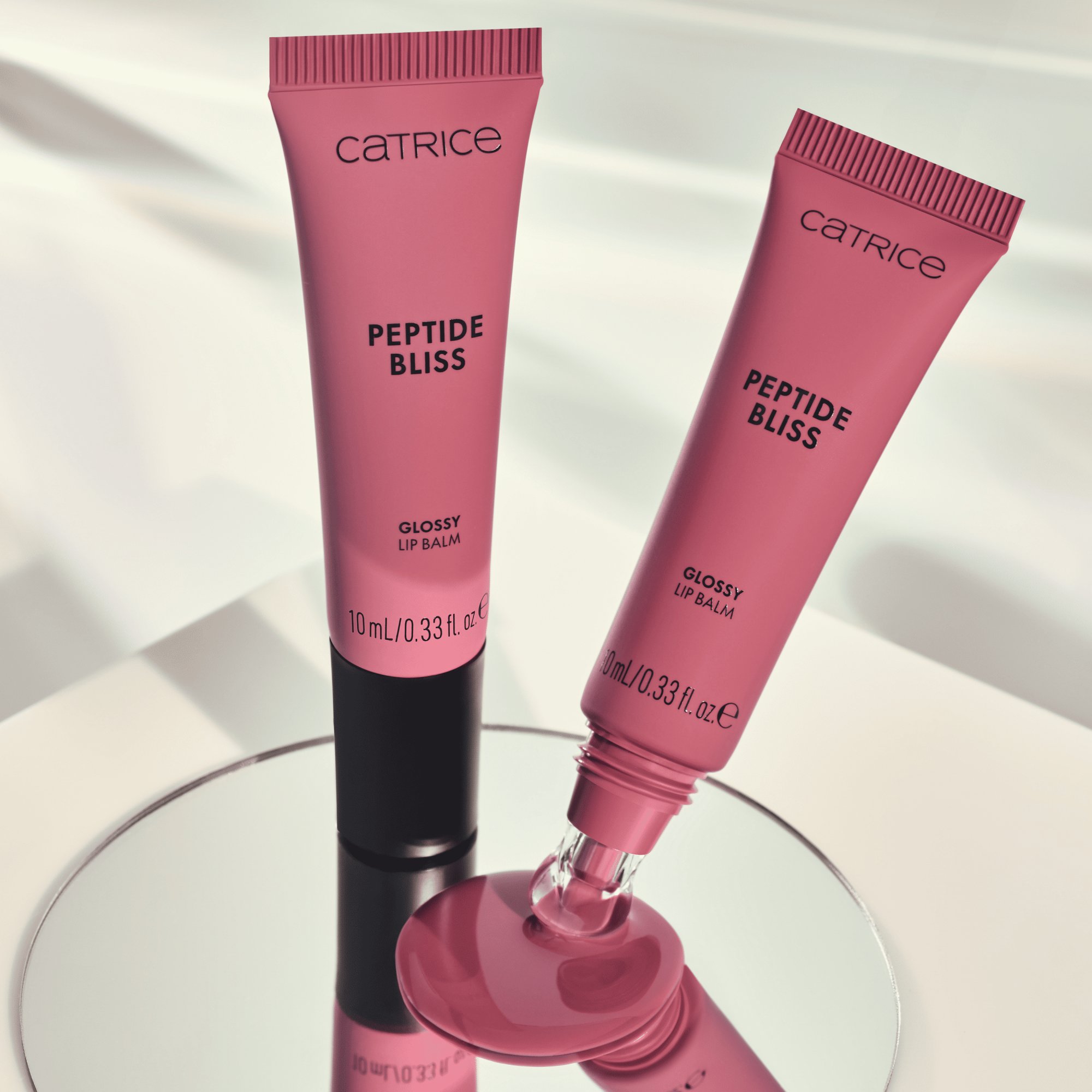 Bild: Catrice Peptide Bliss Glossy Lip Balm Blissberry 020