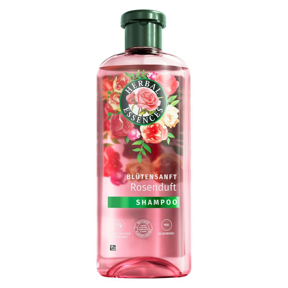 Herbal Essences Blütensanft Rosenduft Shampoo, mit dem Hinweis "90% natürlichen Ursprungs" auf der Vorderseite der Flasche.