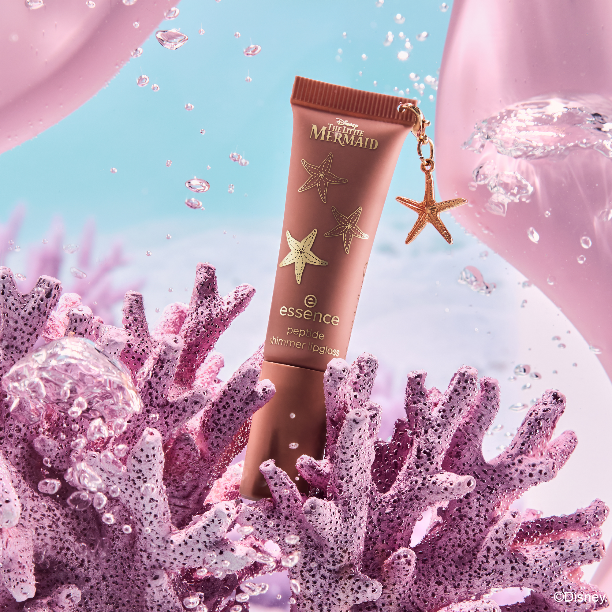 Bild: essence Disney THE LITTLE MERMAID peptide shimmer lipgloss Seaside Romance 