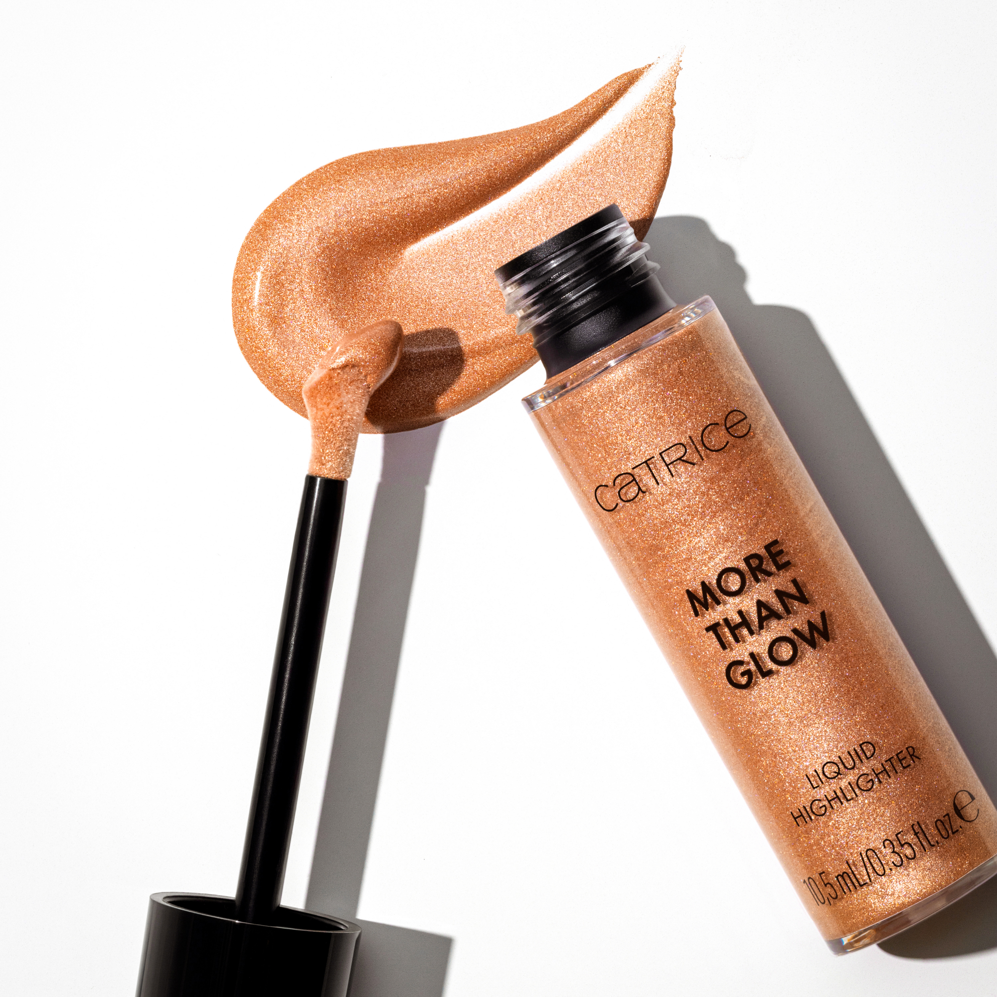 Bild: Catrice More Than Glow Liquid Highlighter Golden Silk 030