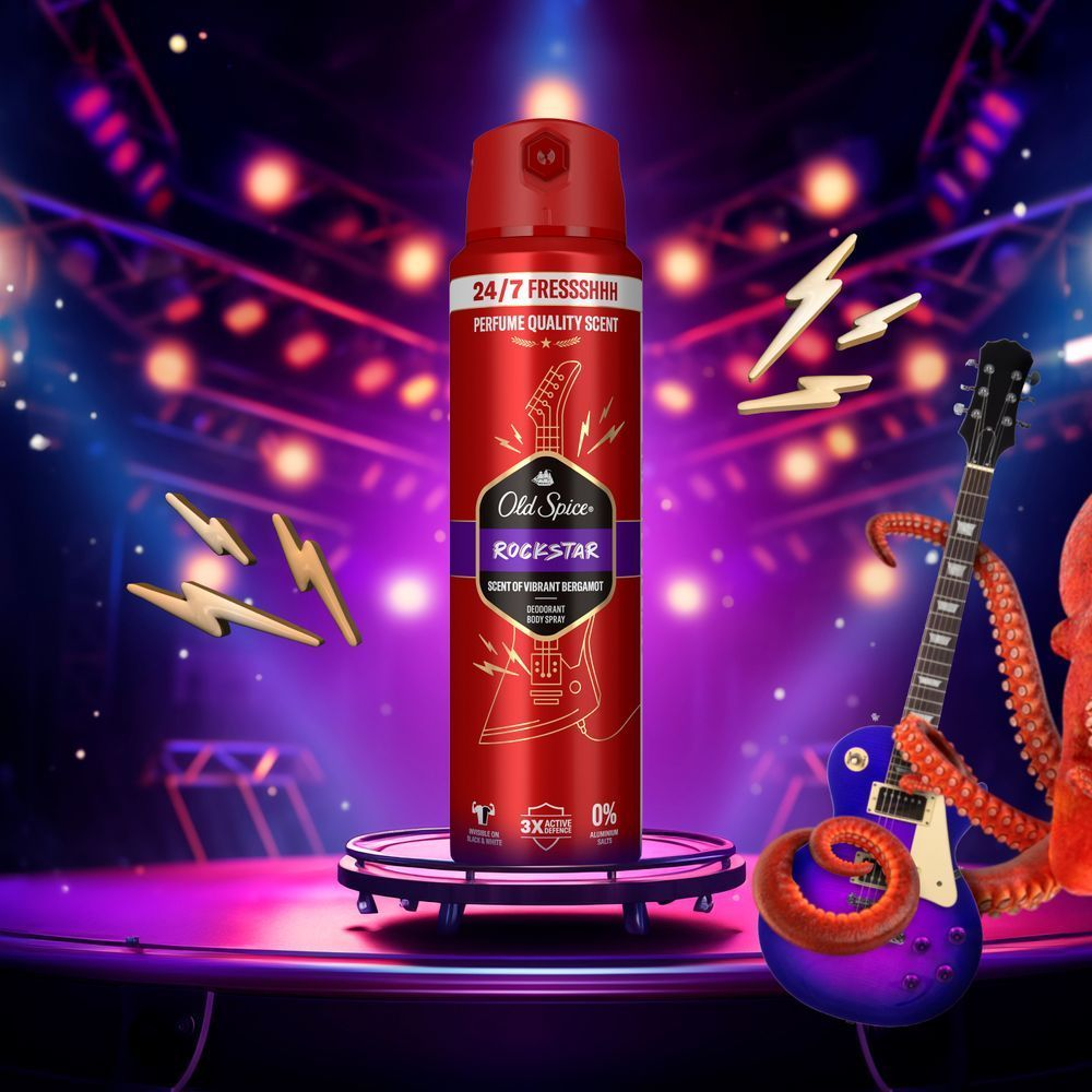Old Spice Rockstar Deodorant-Spray, inszeniert auf einer Bühne mit Gitarren und Blitzen, für einen rockigen Duft.