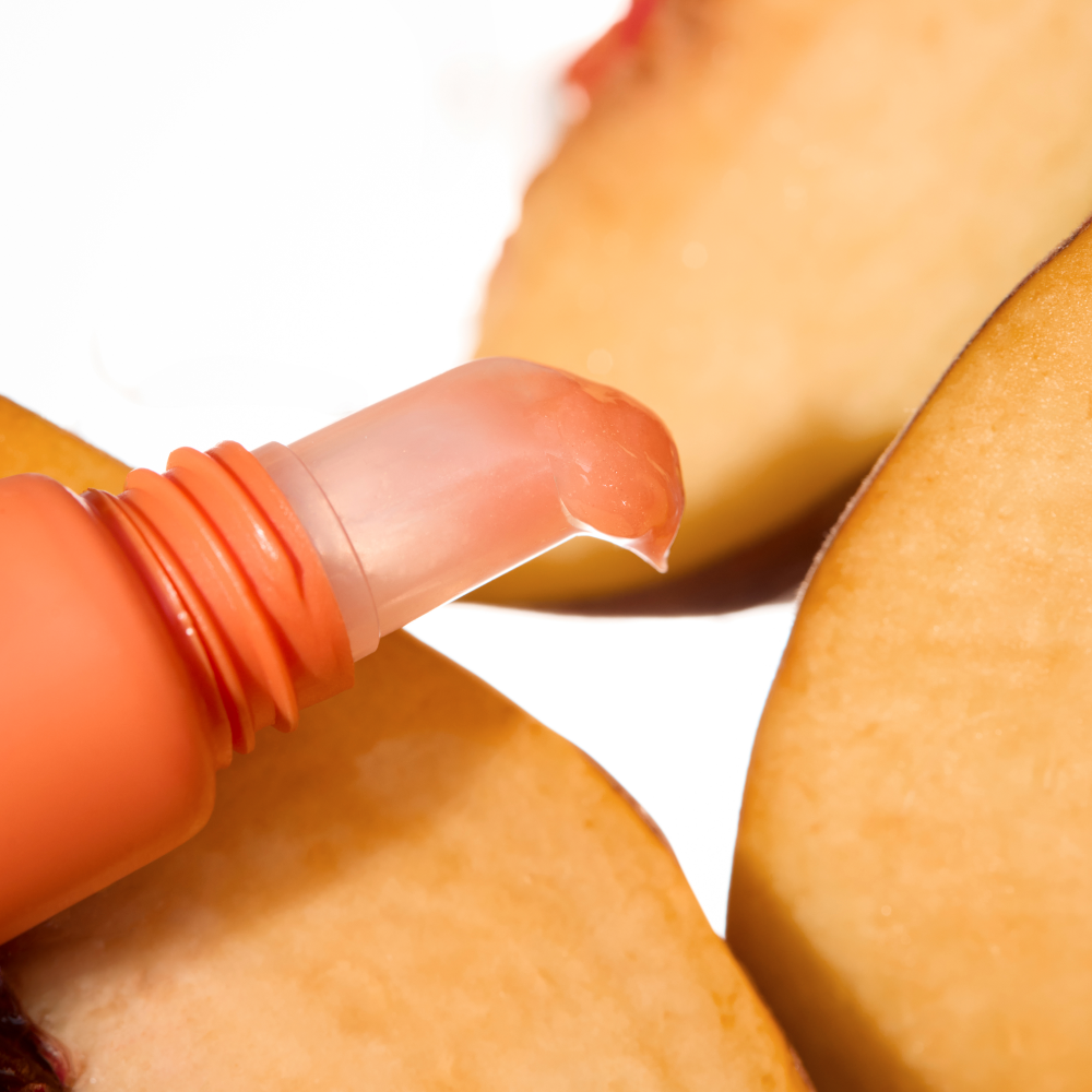 Bild: Catrice The Summer Edit Peptide Lipgloss Peach Iced Tea