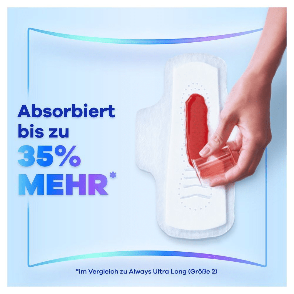 Hand lässt rote Flüssigkeit in die Binde fließen, welche bis zu 35% mehr absorbiert.