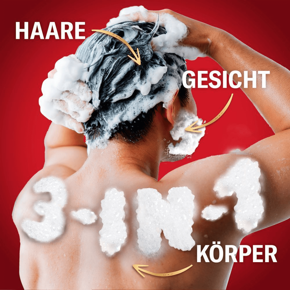 Mann wäscht Haare, Gesicht und Körper mit schäumendem Old Spice 3-in-1 Produkt.