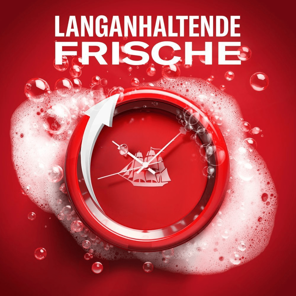 Eine Uhr mit dem Old Spice Logo, umgeben von Seifenblasen, die langanhaltende Frische symbolisiert.