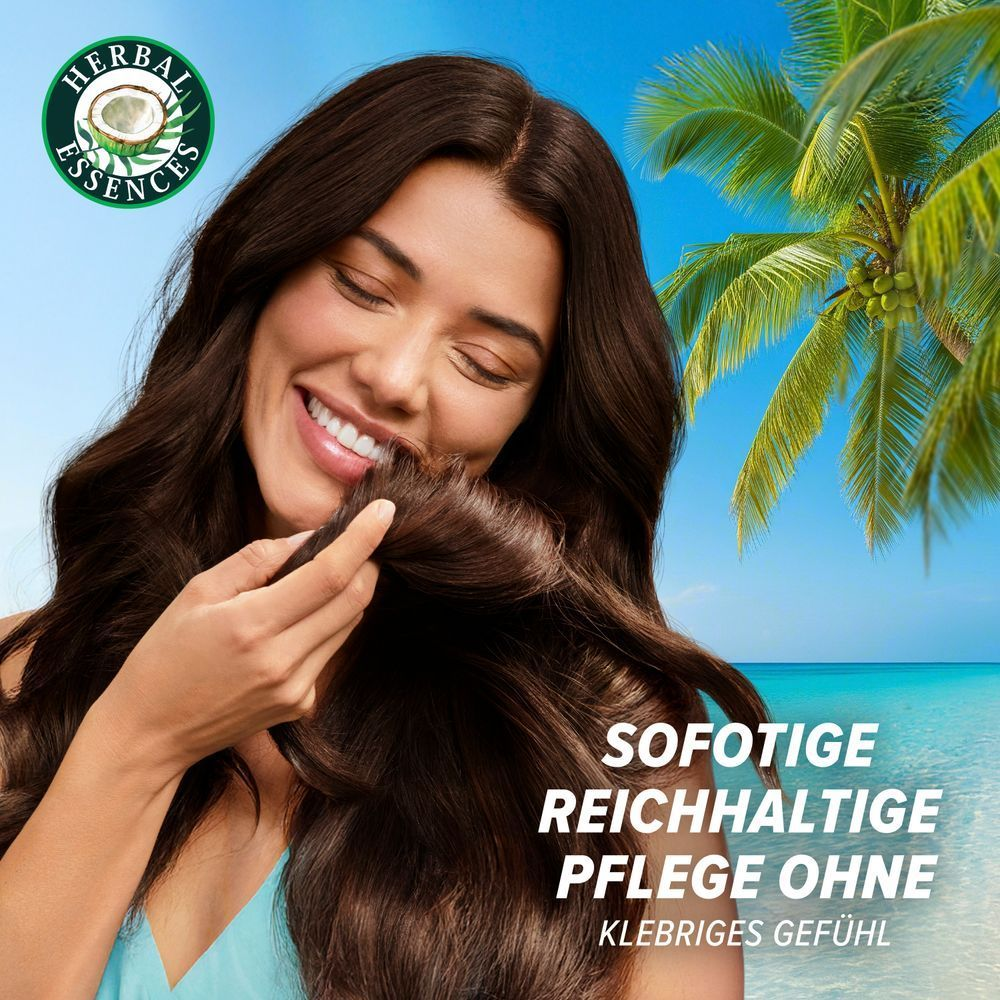 Frau genießt Herbal Essences für sofortige, reichhaltige Pflege ohne klebriges Gefühl.