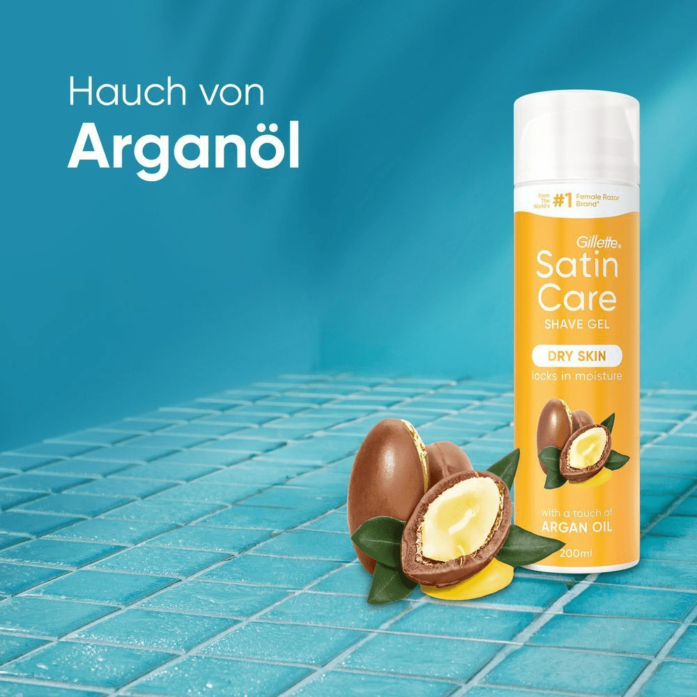 Orange Gillette Satin Care Argan Oil Rasiergel vor einem türkisfarbenen Fliesenhintergrund.