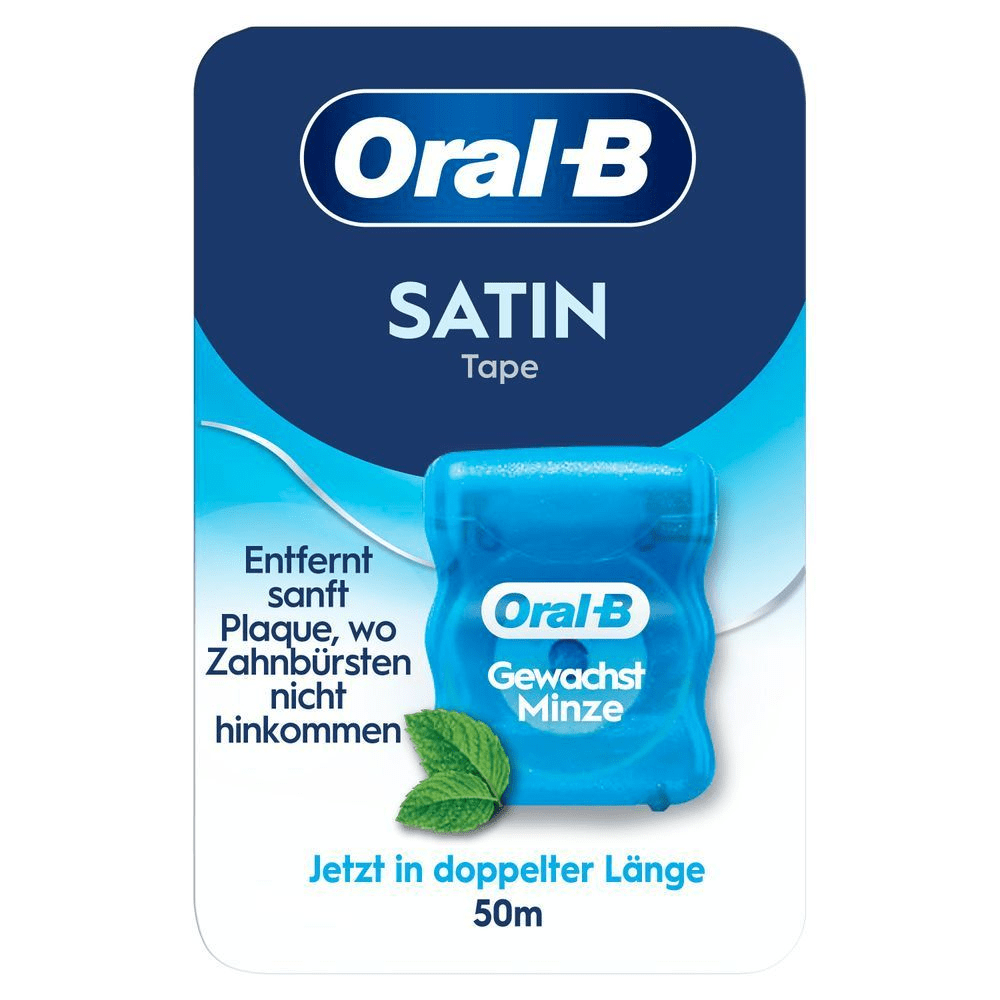 Oral-B Satin Tape Verpackung mit dem Hinweis "Entfernt sanft Plaque, wo Zahnbürsten nicht hinkommen" und "Jetzt in doppelter Länge".
